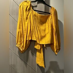 Express yellow ballon sleeve blouse with open bow back